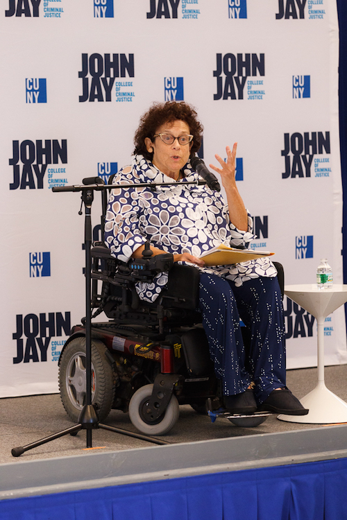Simi Linton in a wheelchair addressing the audience during Dance/NYC's Disability.Dance.Artistry panel